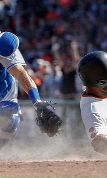 Giants clinch 2nd NL wild card, complete sweep of Dodgers